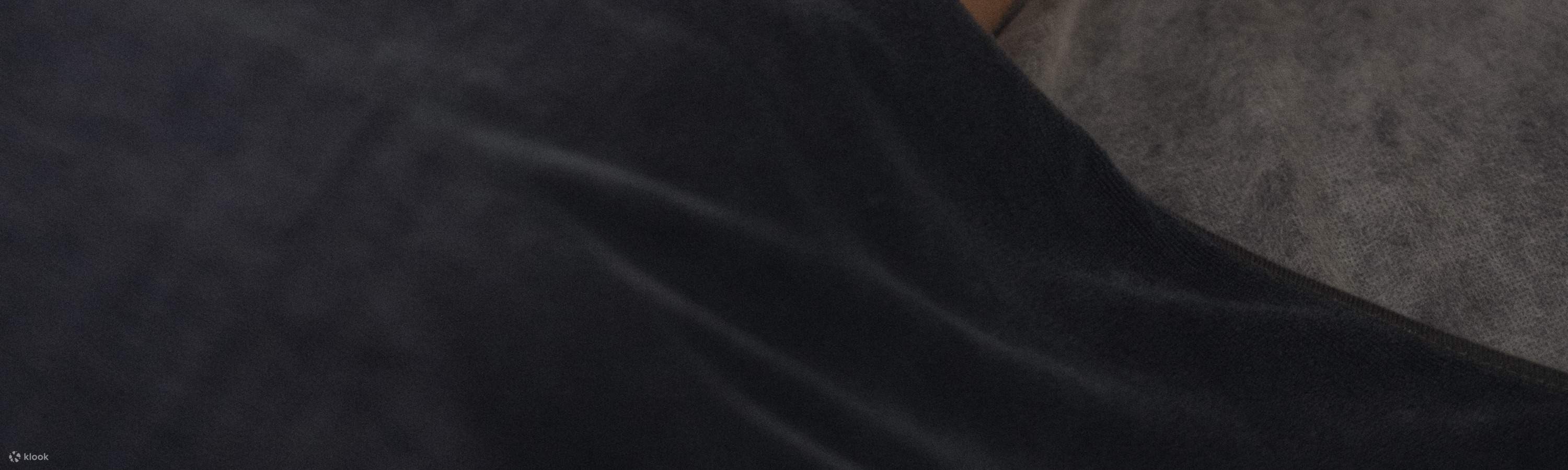 Massaggio con olio di conchiglie di lava